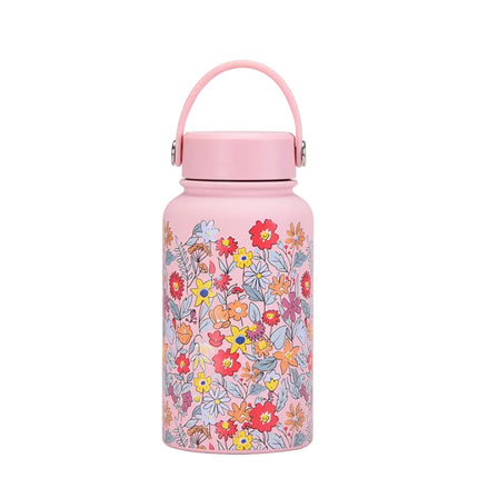 Pink thermos bottle with floral design on a white background
